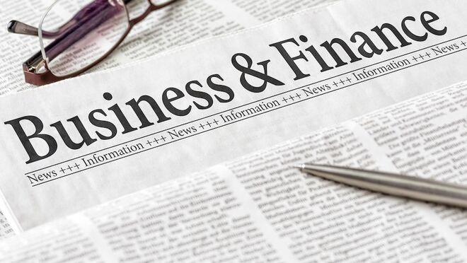 A,Newspaper,With,The,Headline,Business,And,Finance